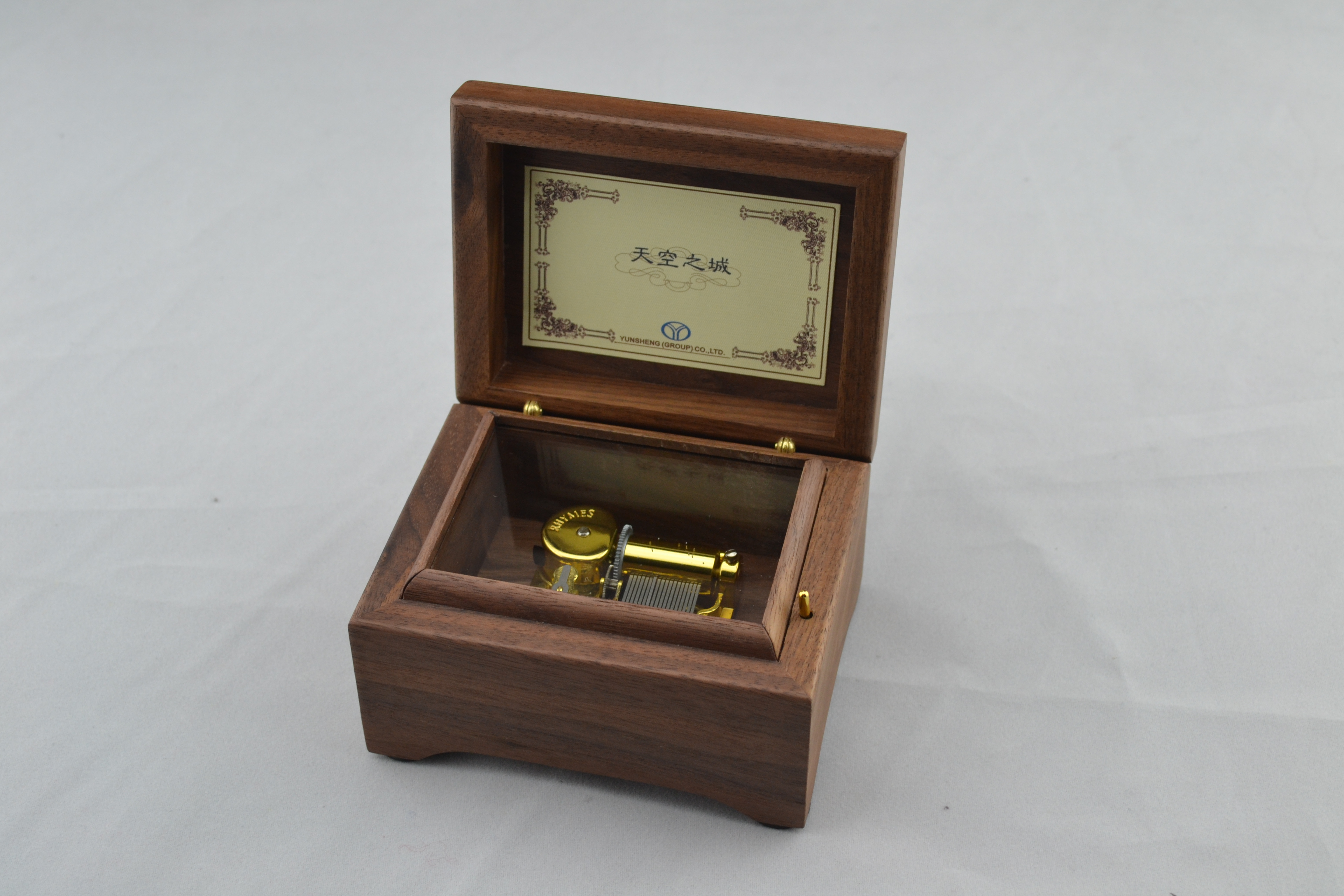 Square wooden music box with golden music box wedding favors music box Featured Image
