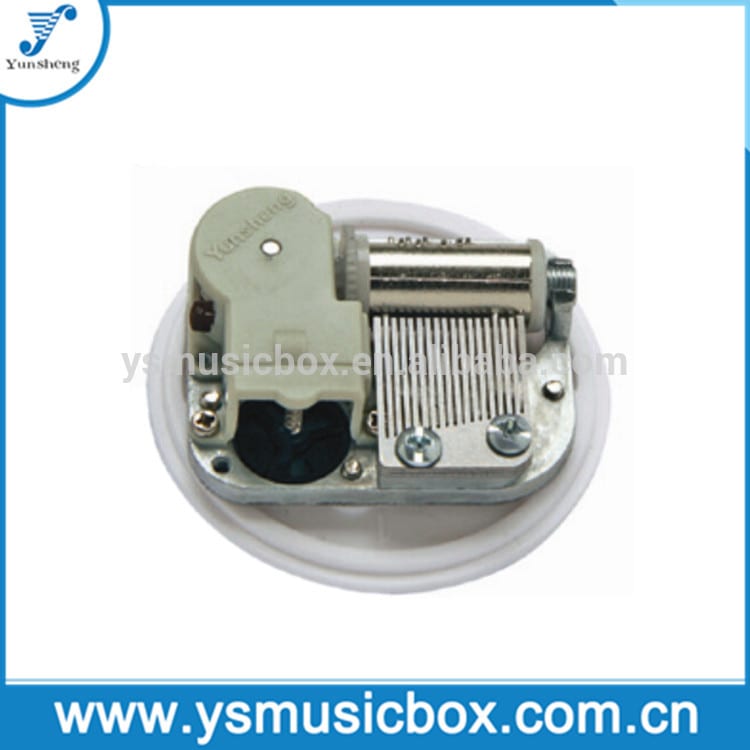 (YM3002EB) Miniature Musical Movement with Center Wind up musical movement Featured Image